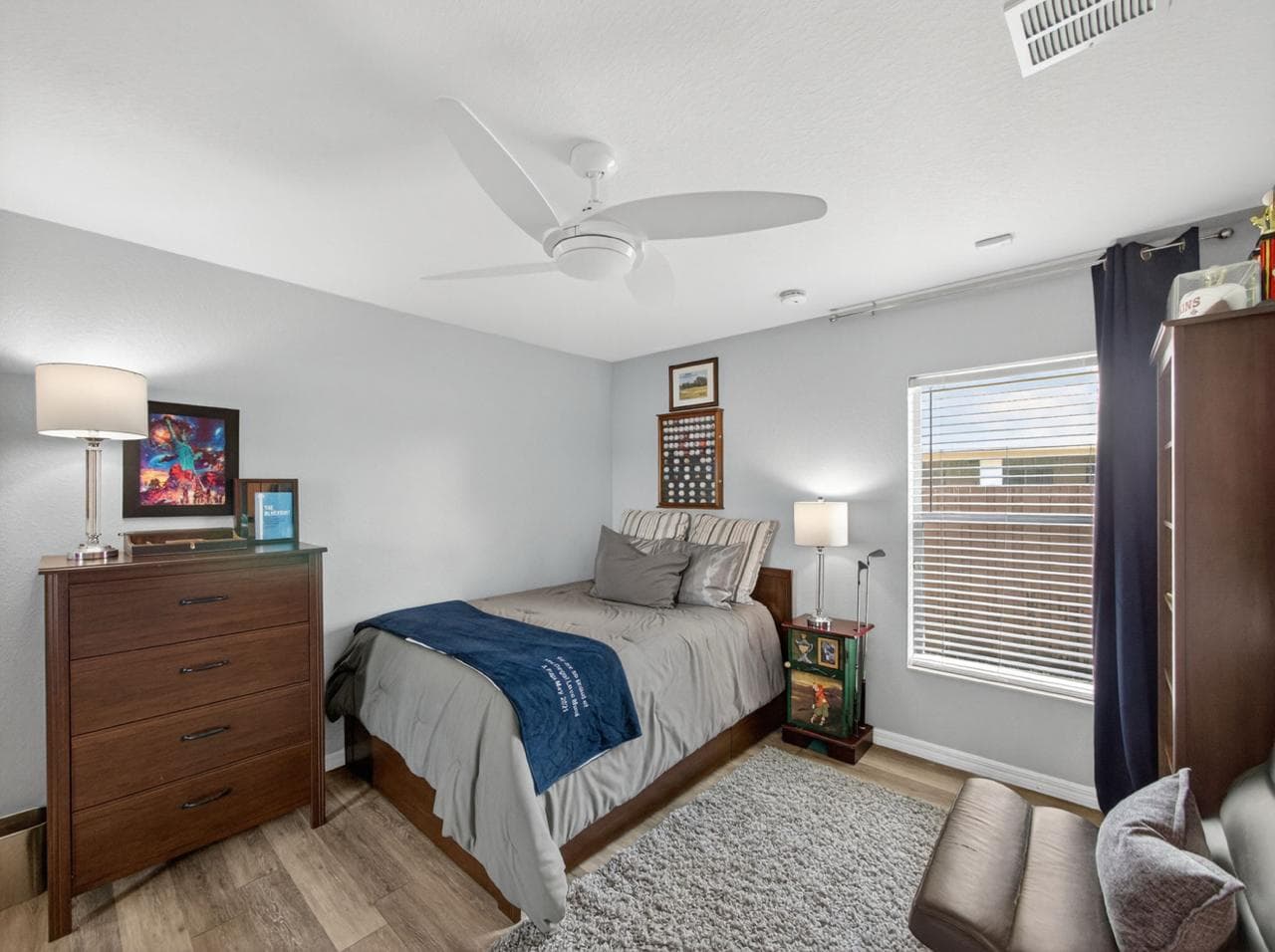 Second bedroom with hardwood floors